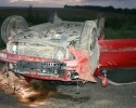 Czołowe zderzenie na DK61. Renault dachowało, jedna osoba w szpitalu (ZDJĘCIA)